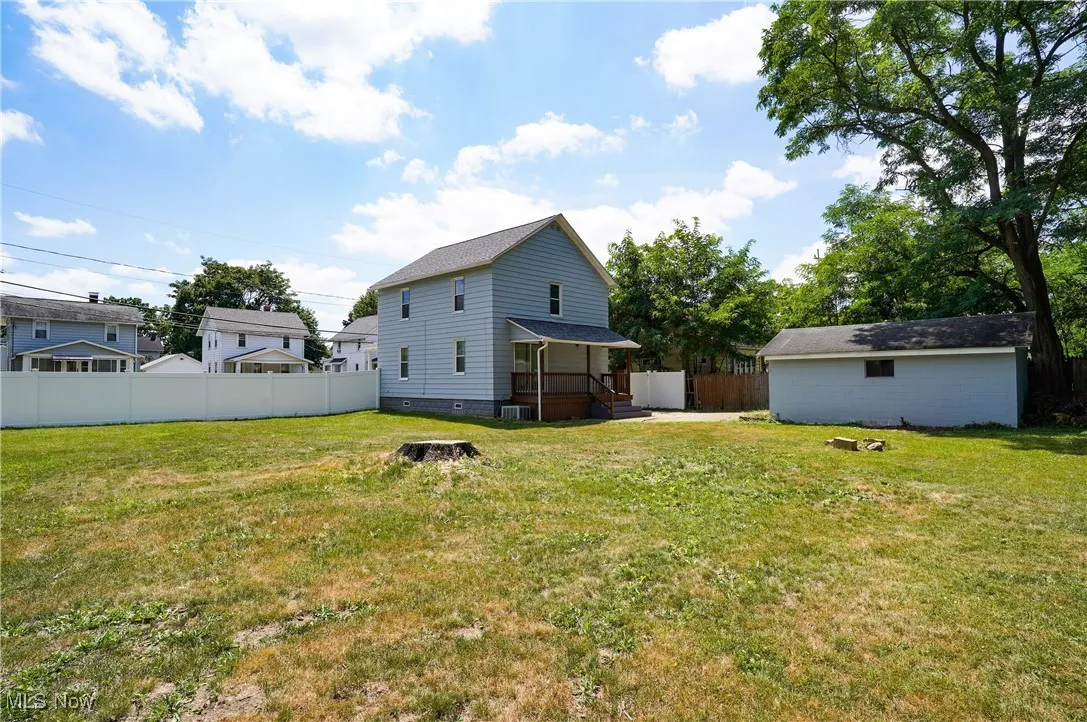 Back of property with crawl space
