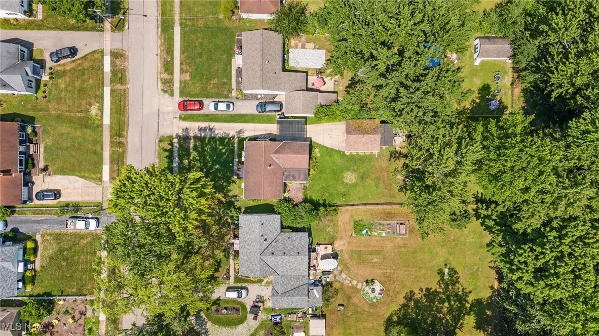 Aerial overview of property's location with nearby suburban area