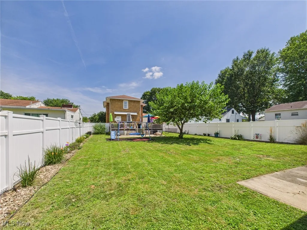 Large vinyl fenced flat back yard