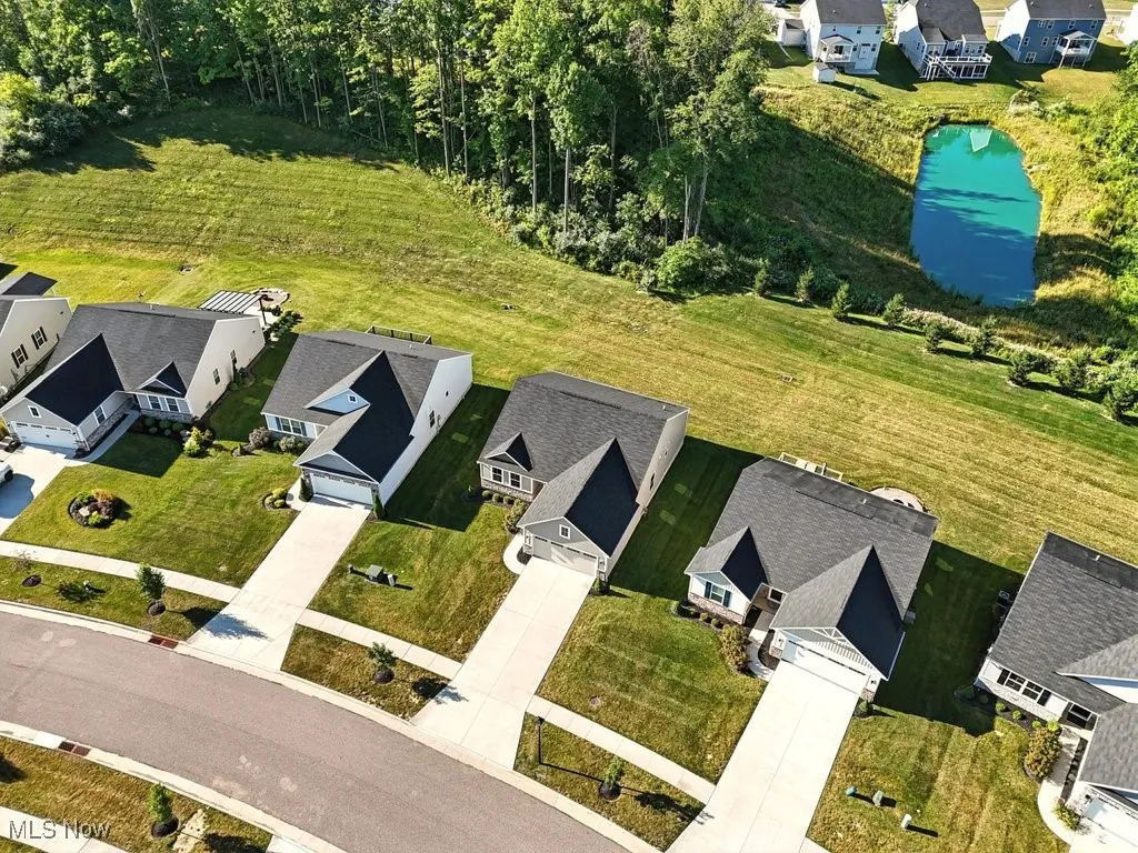 Aerial view of residential area with a large body of water