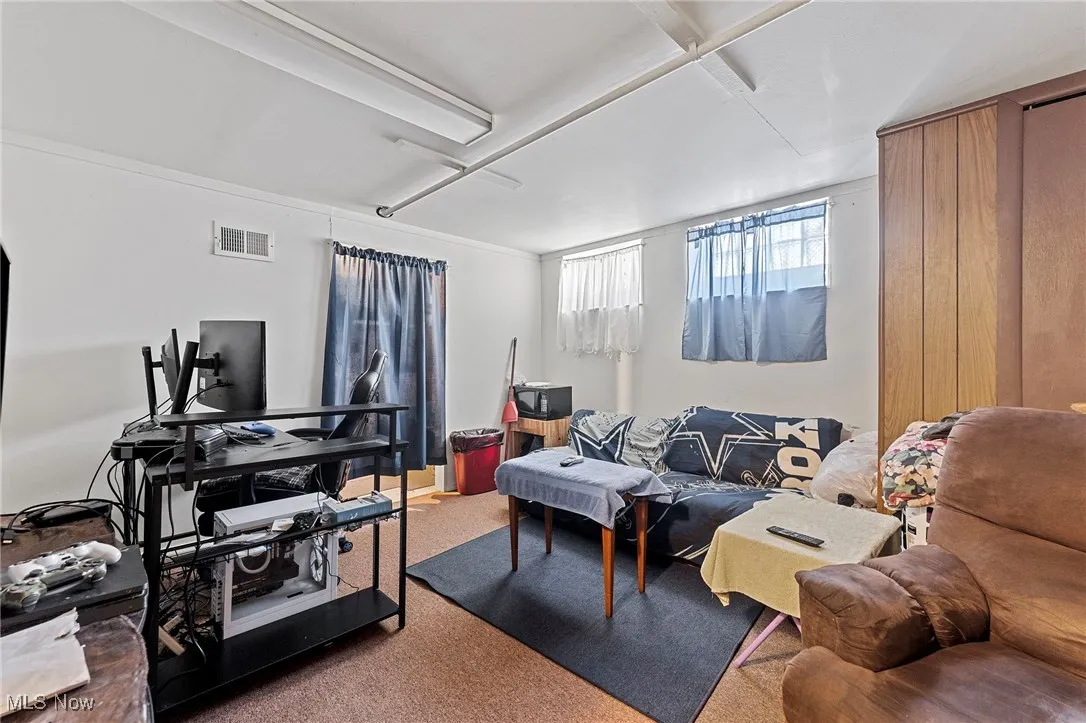 Living area with carpet floors