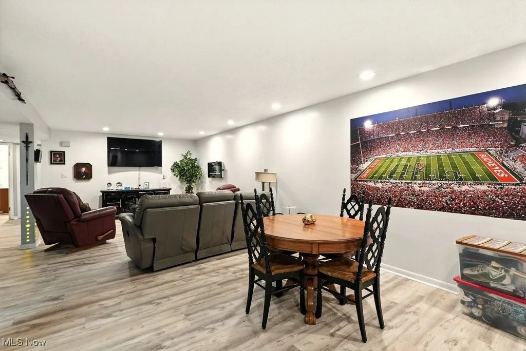 Dining area featuring recessed lighting and wood finished floors