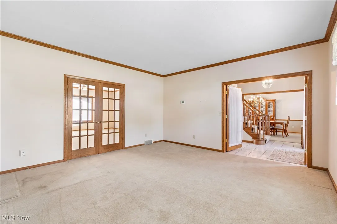 Formal Livingroom w/French Doors could be used as Home Office