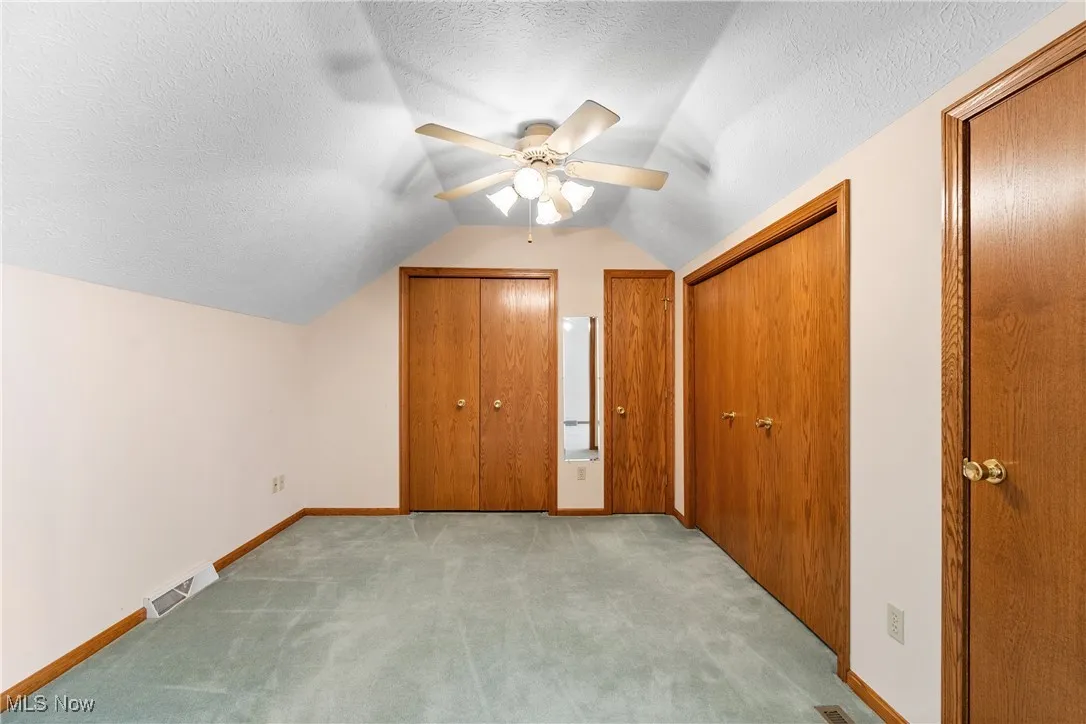 Sitting/dressing area or use as nursery. View of closets
