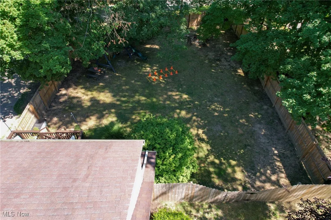 View of fenced backyard