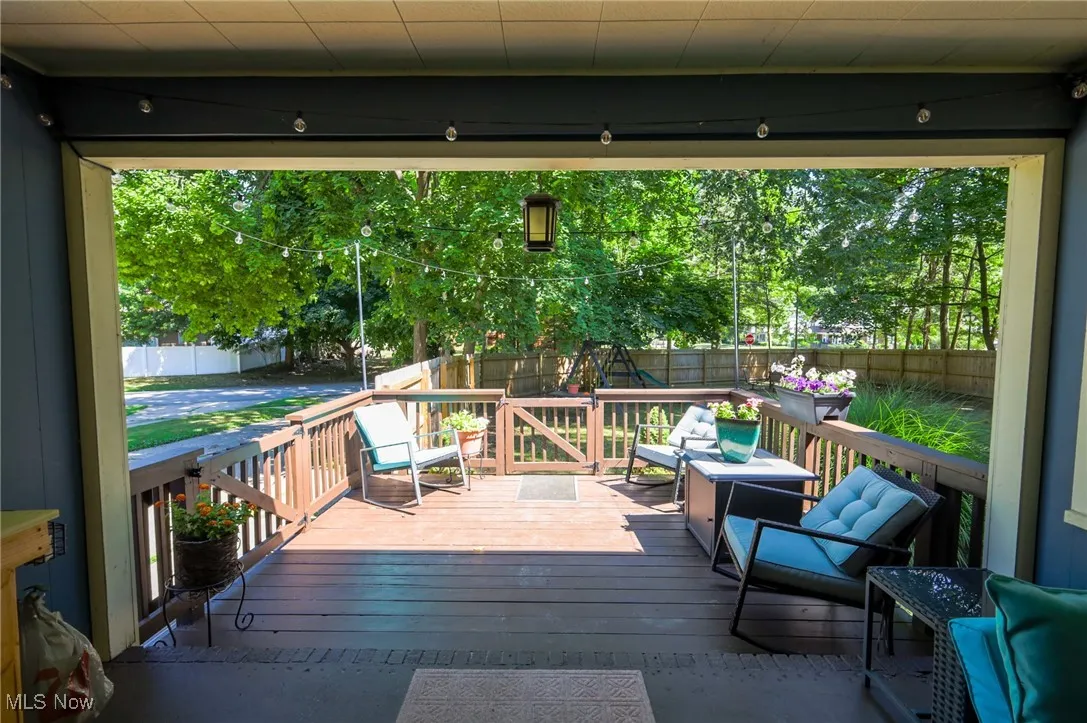 Deck with a fenced backyard