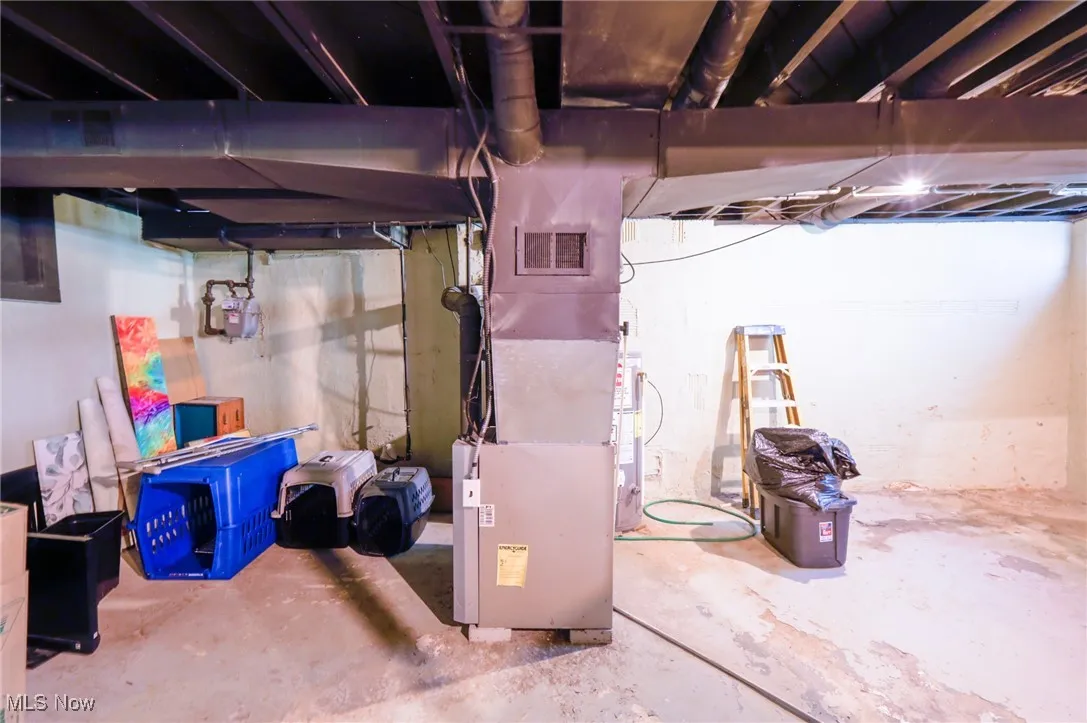 Unfinished basement with heating unit