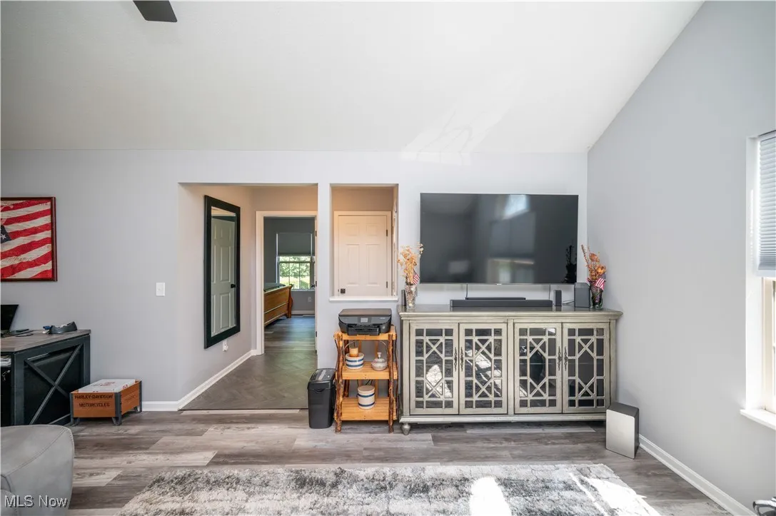 Living Area looking through Foyer into Secondary Bedroom.