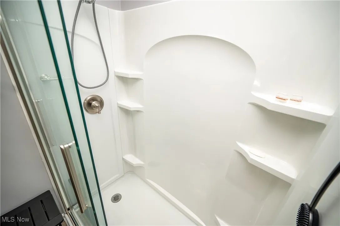 Bathroom featuring an enclosed shower