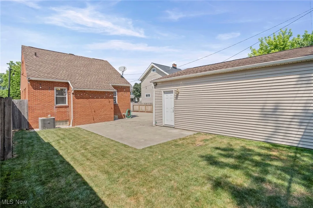 View of yard with a patio area