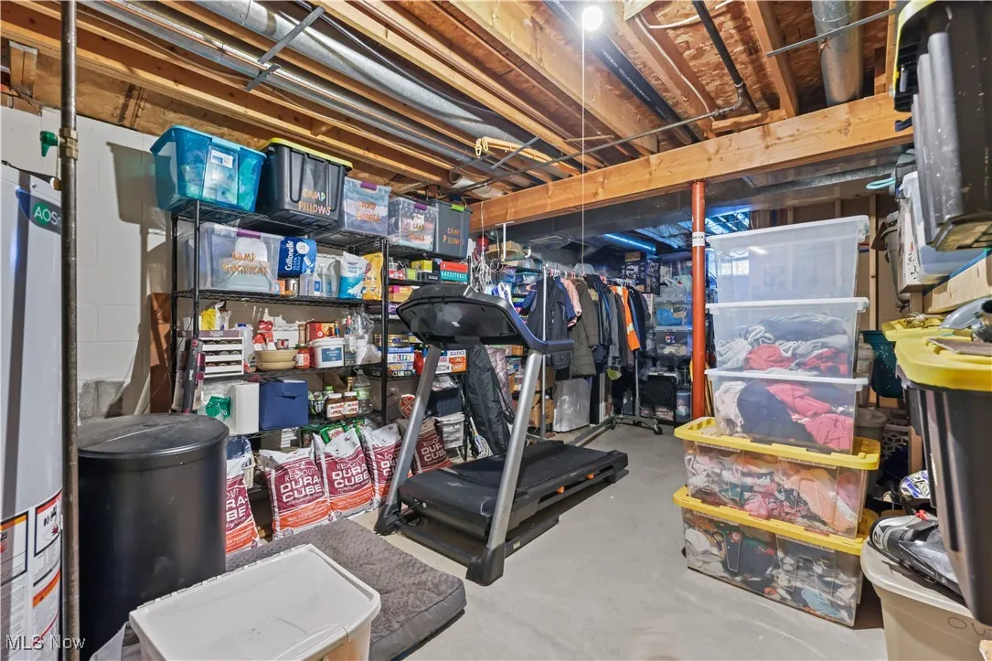 Unfinished basement with gas water heater