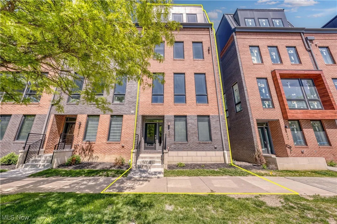 View of front of house featuring brick siding