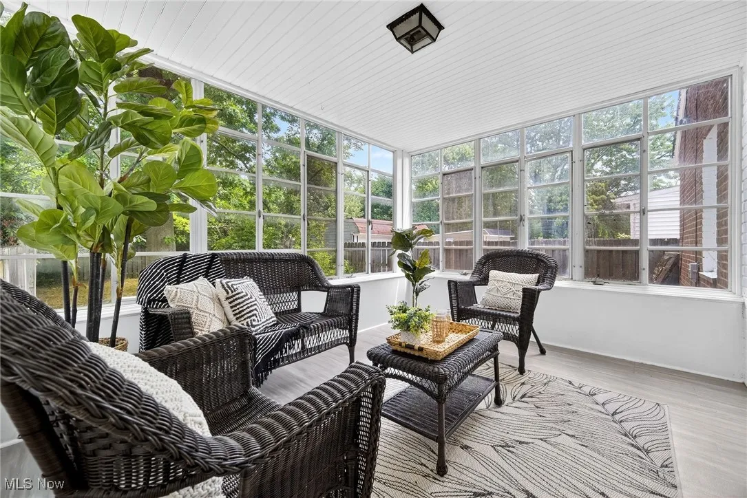 Sunroom with outdoor lounge area
