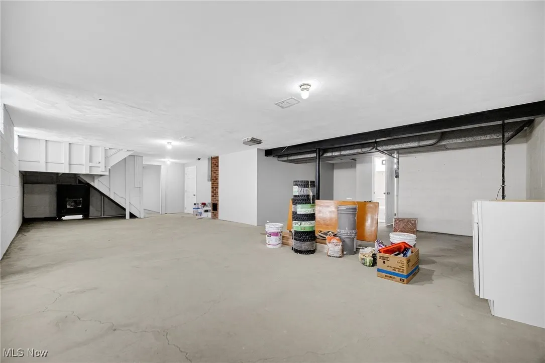 Finished below grade area featuring stairs