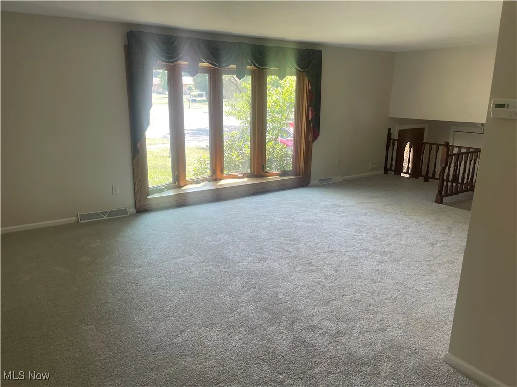 living room with bay widow