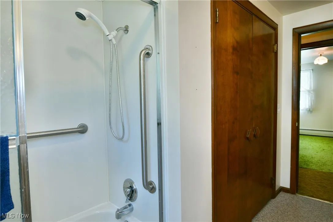 Bathroom featuring bathtub / shower combination