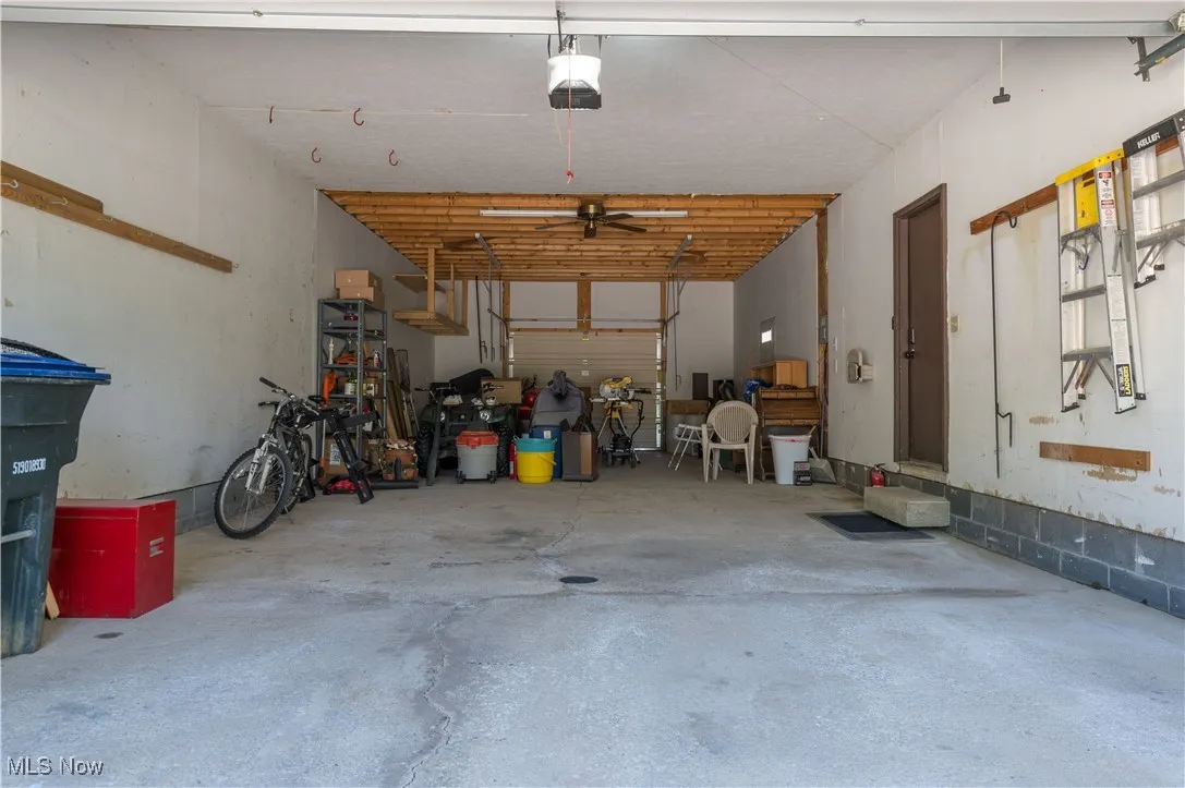 Garage featuring a garage door opener