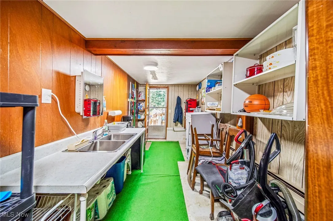 Storage room featuring a sink