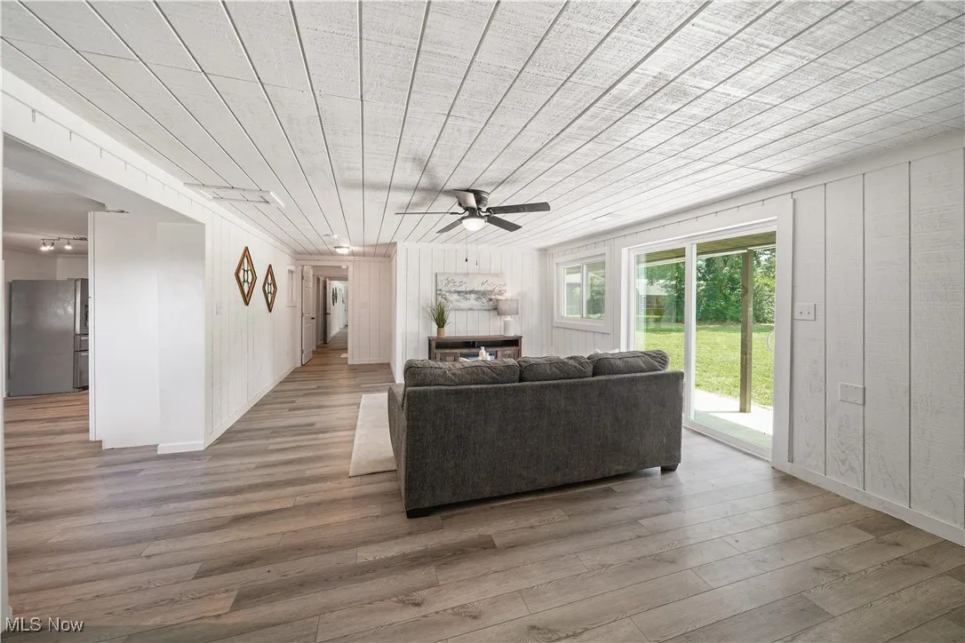 family room off the kitchen.  Slider transitions to the covered back yard porch.