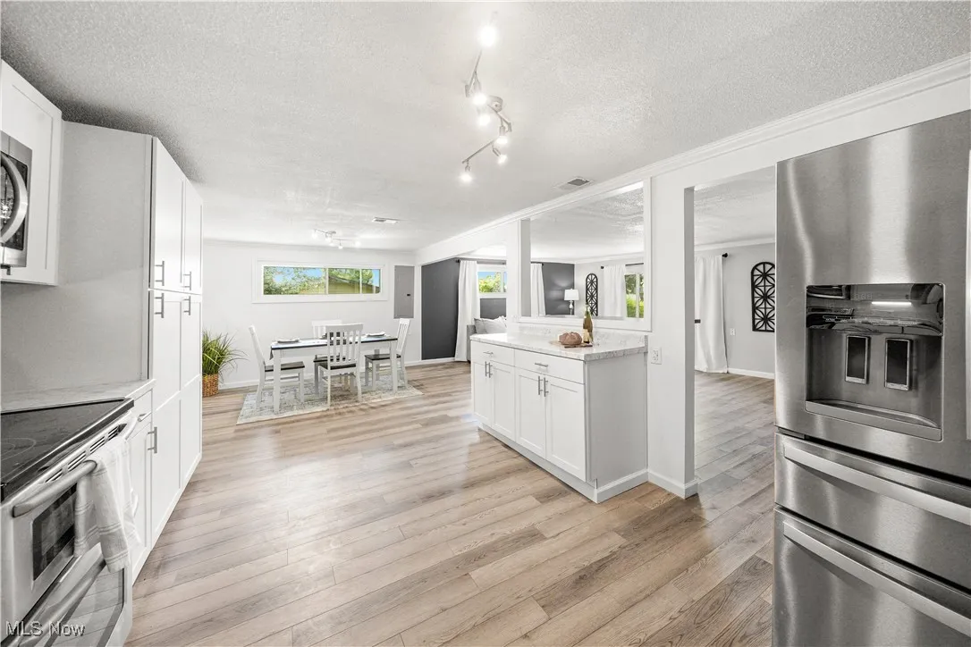view of the kitchen to dining space.