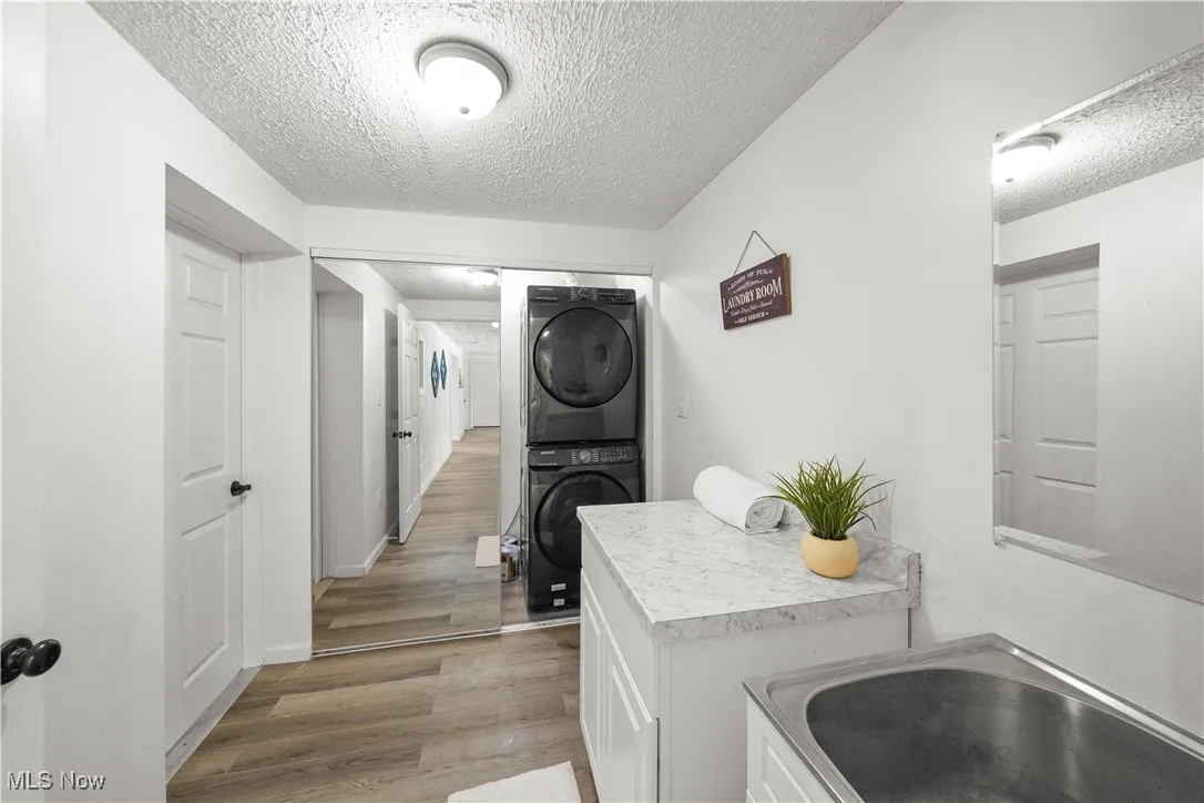 laundry room with newer washer and dryer included.