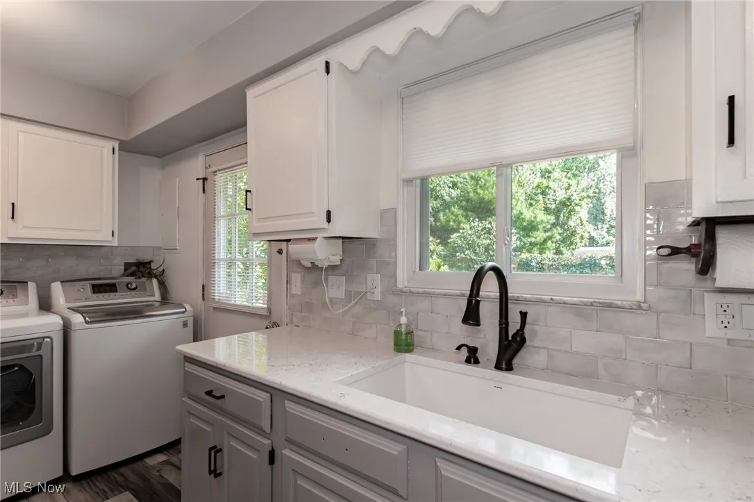 kitchen sink with new tile backsplash
