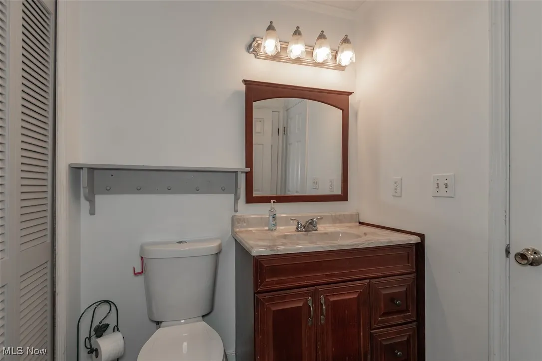 Half bath connected to primary bedroom