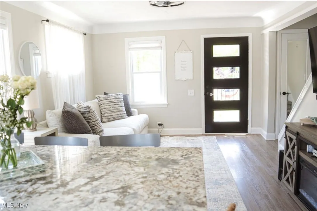 Entryway featuring wood finished floors and baseboards