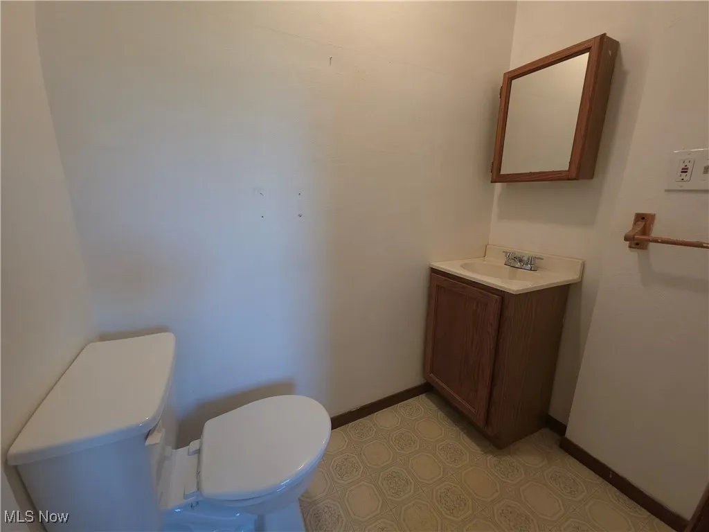 Half Bathroom in Back Right Bedroom