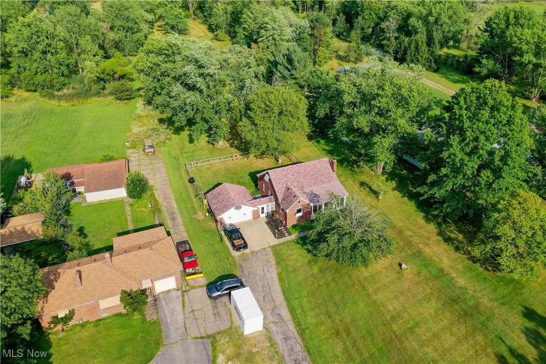 Large backyard with pond and shed