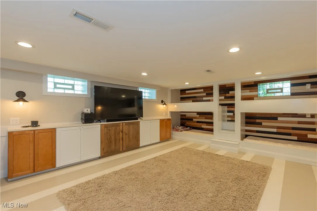 Rec Room also features bunk bed and custom cabinetry