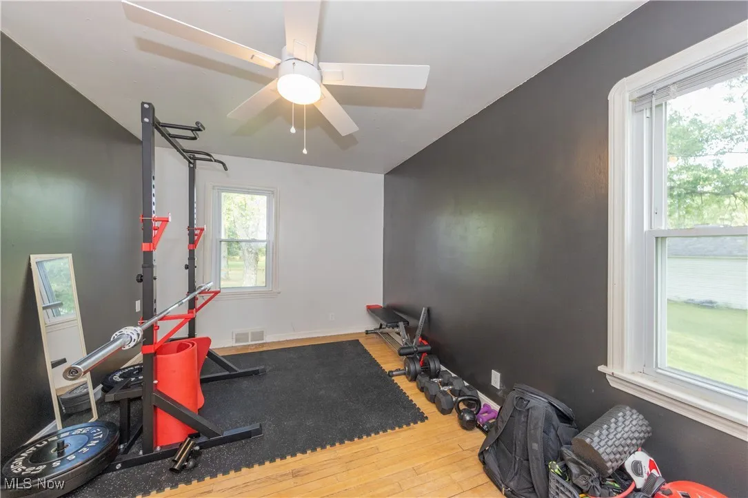 Main floor Bedroom 1 currently used as workout room