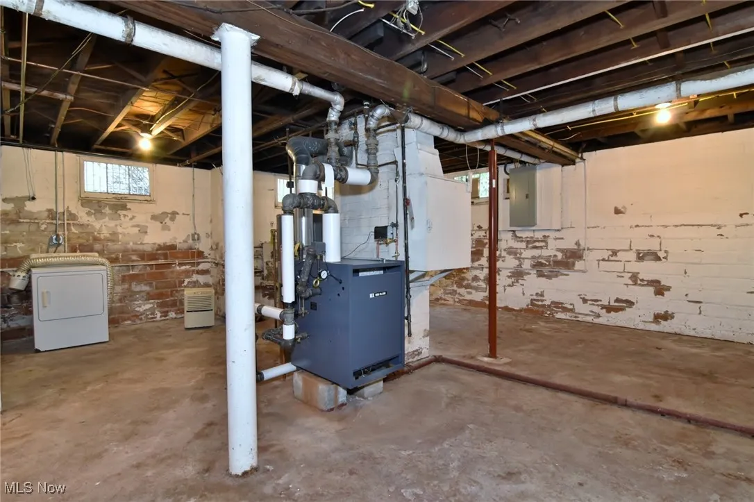 Basement featuring washer / clothes dryer and electric panel