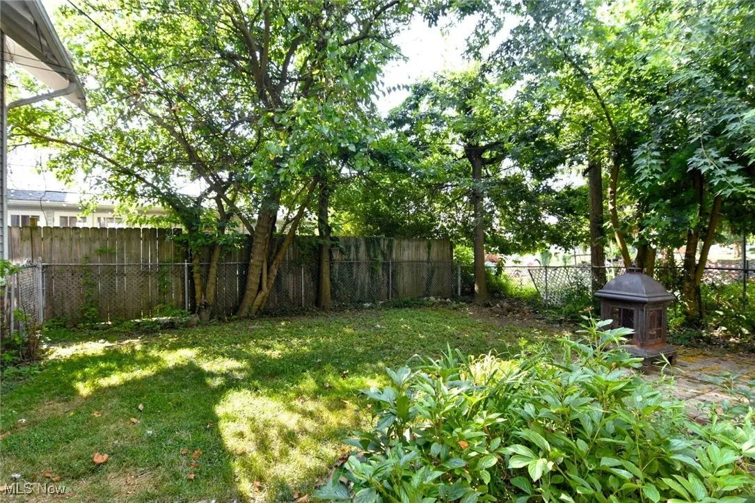 View of fenced backyard