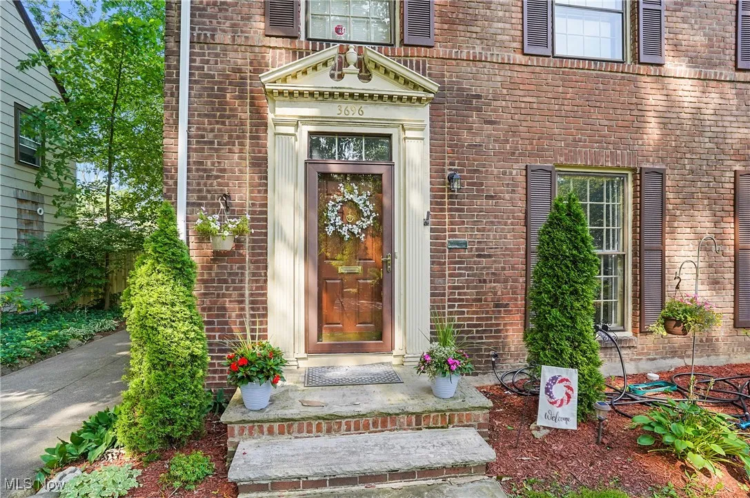 Property entrance with brick siding