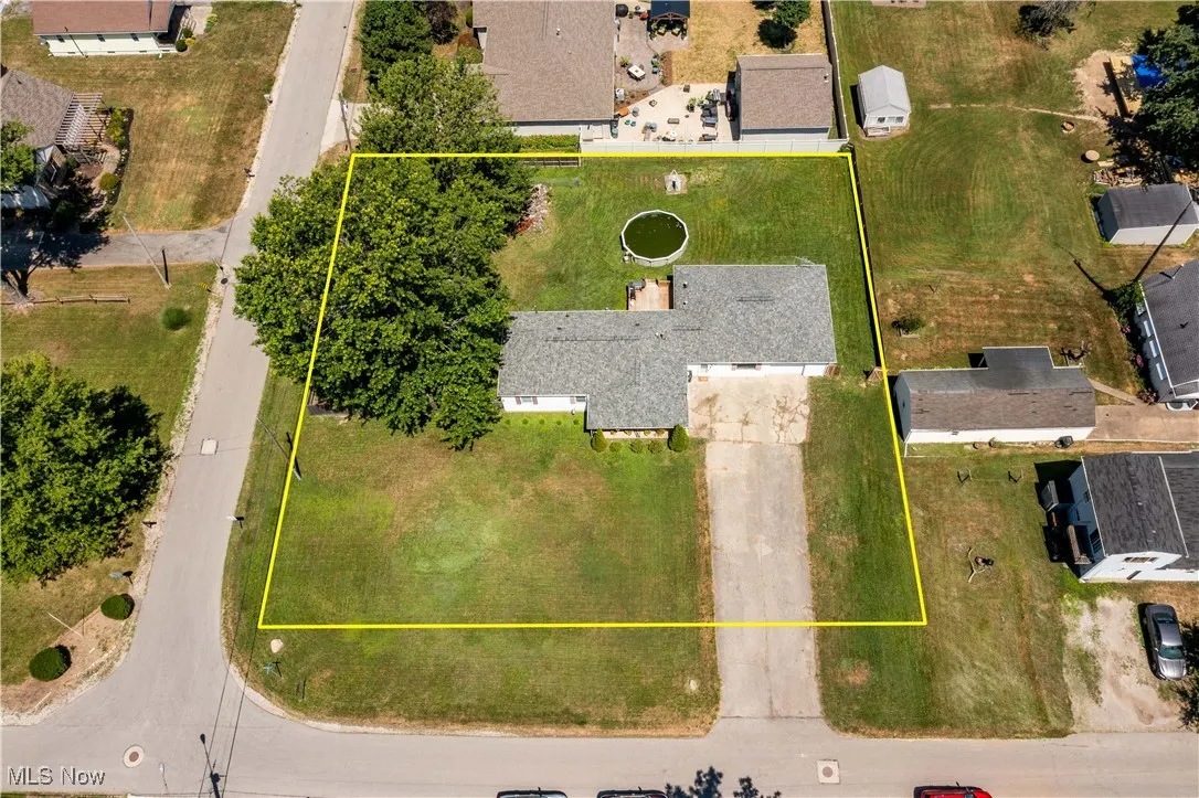 Aerial view of property with outline