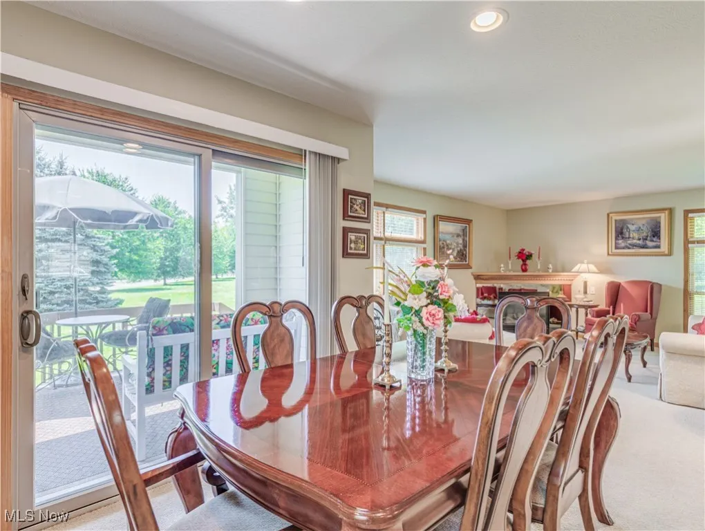 Dining room with sliding door to the rear deck, which is partly covered