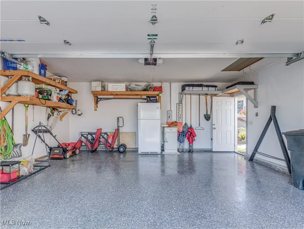newer epoxy floor finish and built-in shelving