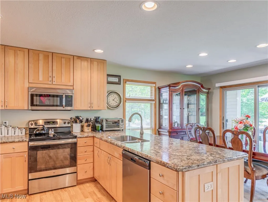 Open kitchen with plenty of cabinet and counter space.  There is a pantry for additional storage