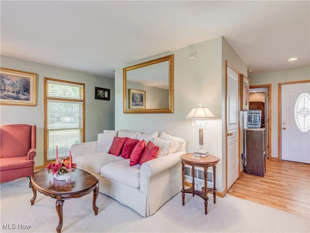 Living room is open to the Dining Room and Kitchen.
