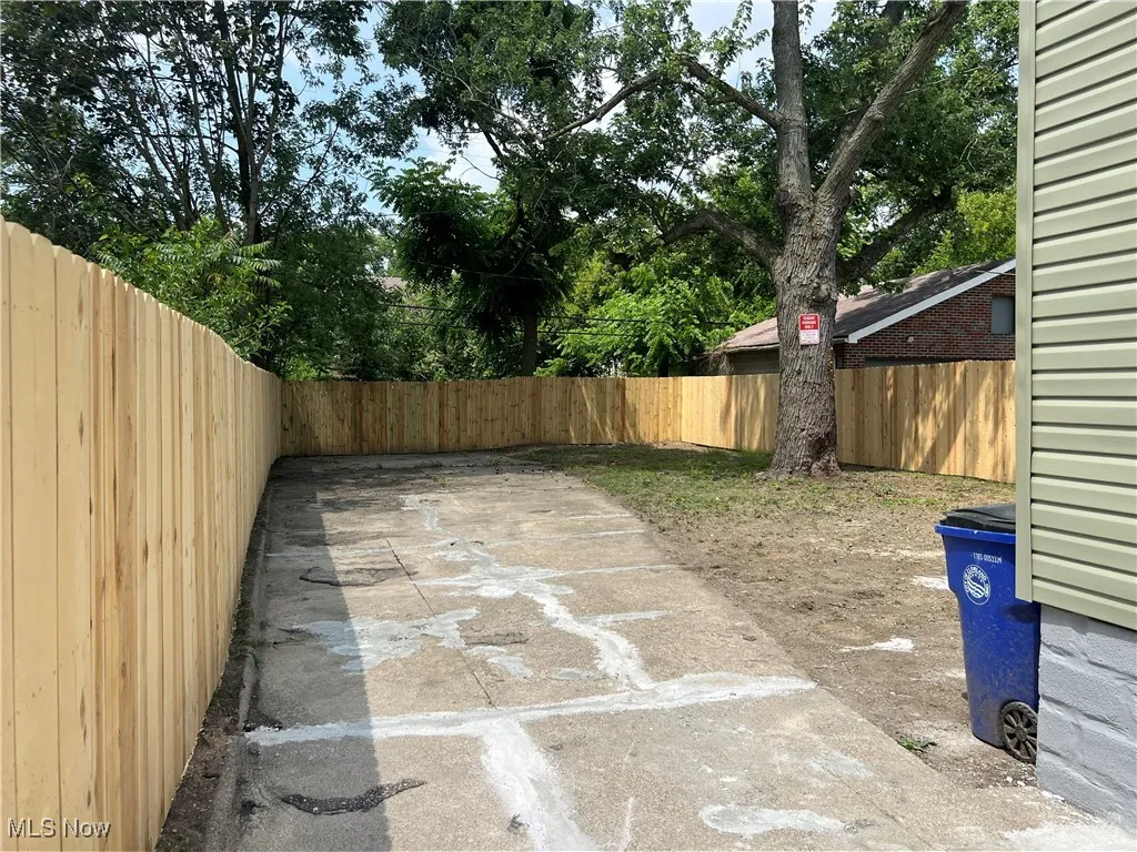 Fenced backyard featuring a patio area