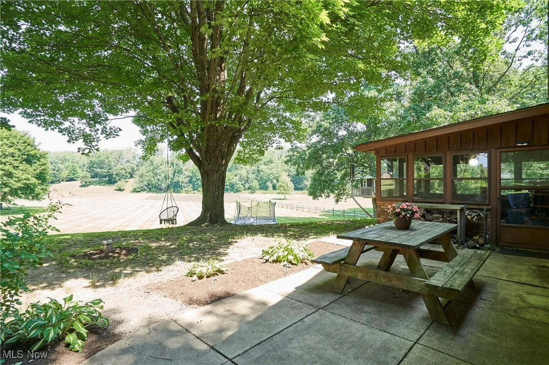 View of patio / terrace with outdoor dining space,sun room