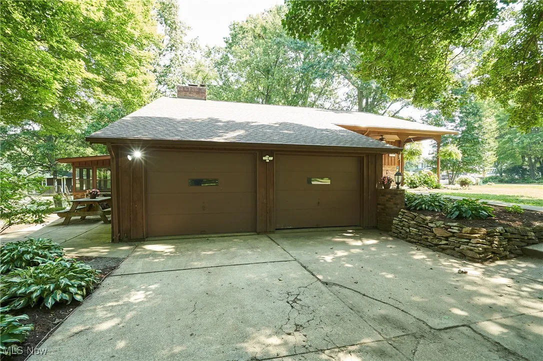 Garage with concrete driveway