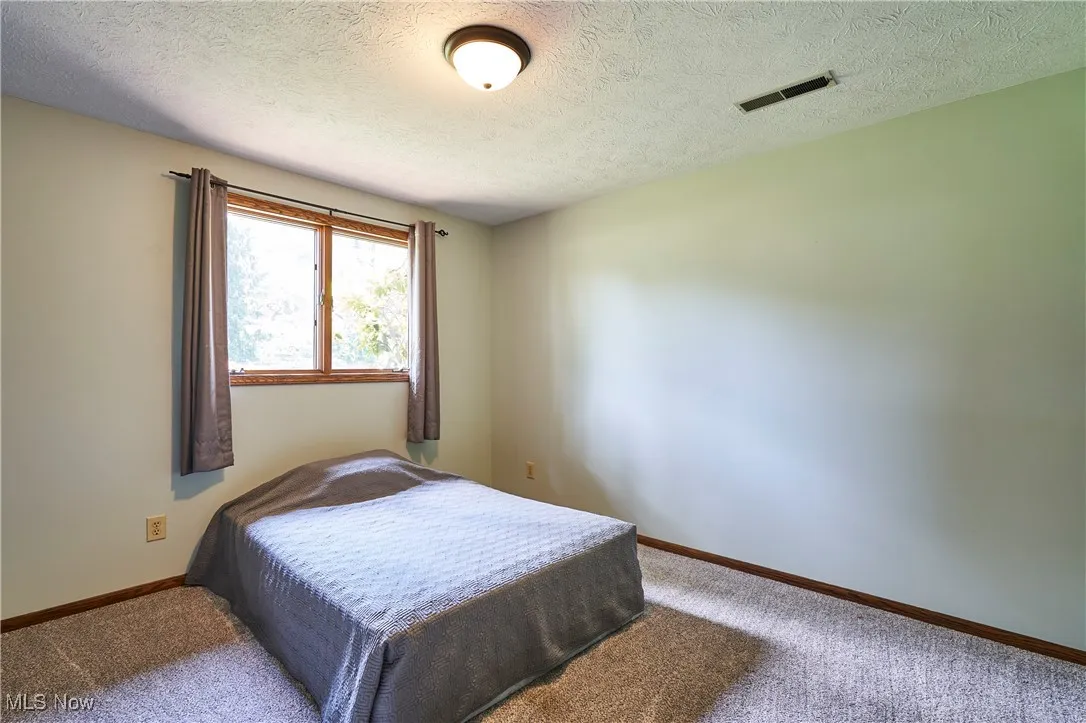 Bedroom with carpet floors