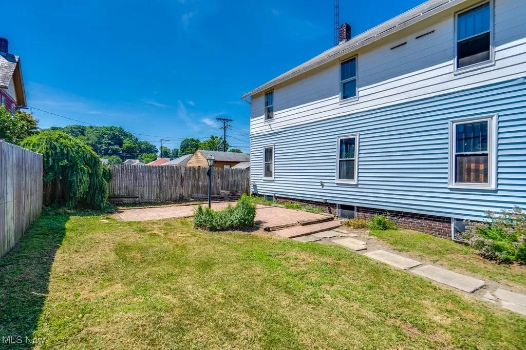 View of fenced backyard
