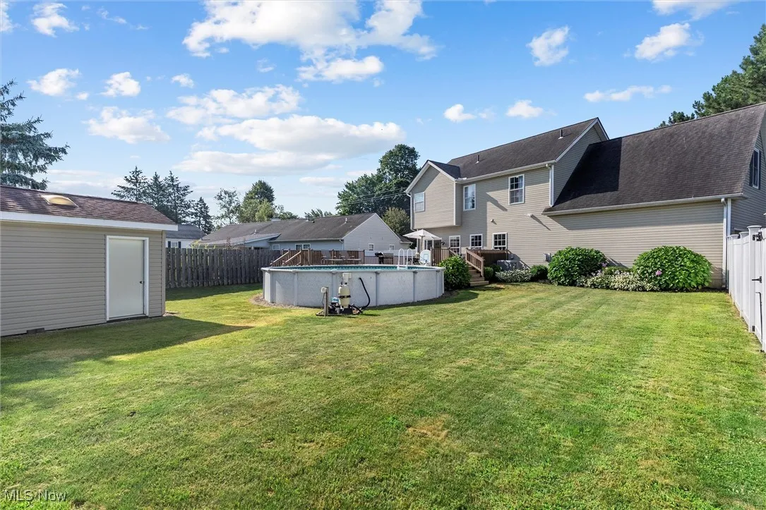 View of fenced backyard