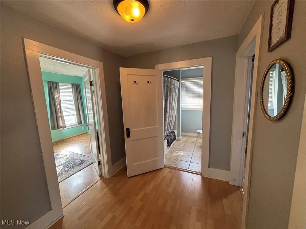 Hallway view of bedroom / full bath area on upper level