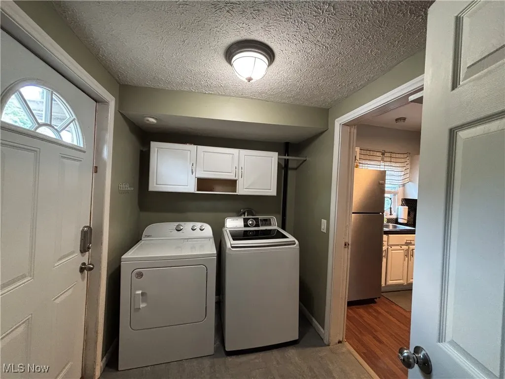 View of laundry room area off kitchen