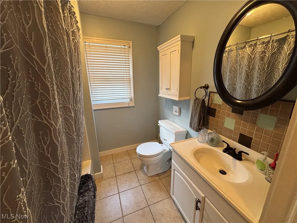 View of full bath area on upper level