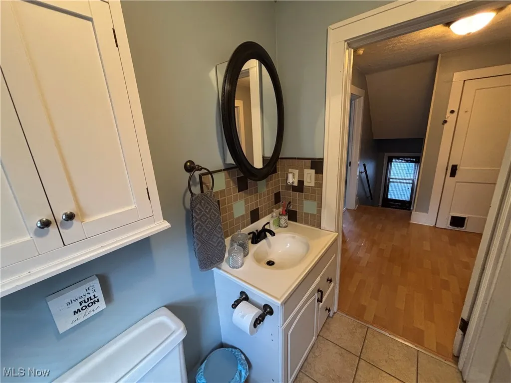 View of full bathroom area